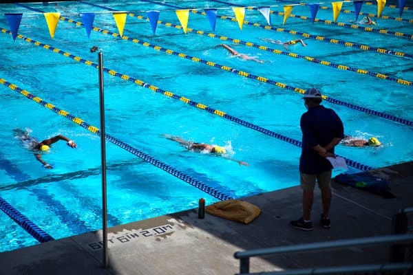 Coach Mark Schubert overseeing a Mission Viejo Nadadores practice on Wednesday in Southern California. The team returned to the pool last Friday.