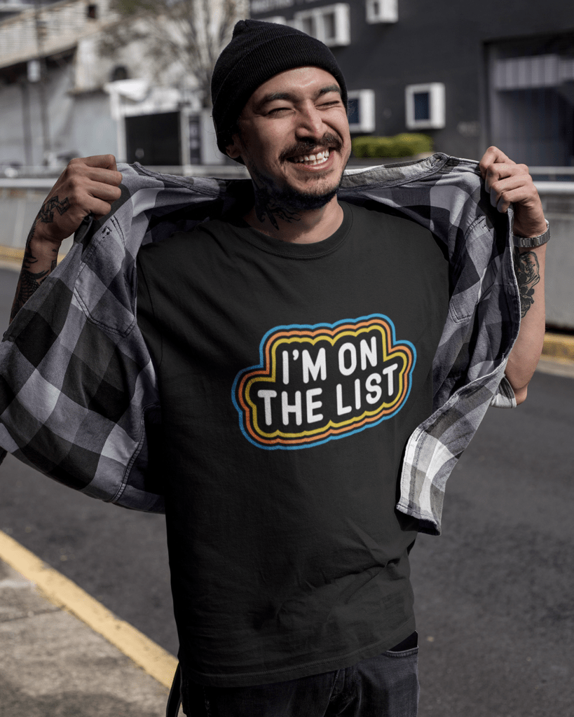 smiling-tattooed-asian-man-wearing-a-round-neck-t-shirt-mockup-outdoors-a17067
